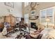 Bright living room featuring a fireplace and cozy seating area at 7301 Heggie Ave, Las Vegas, NV 89131