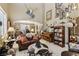 Open-concept living room with a fireplace and comfortable furniture at 7301 Heggie Ave, Las Vegas, NV 89131