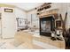 Tranquil bathroom with a fireplace, jetted tub, and a serene ambiance at 7301 Heggie Ave, Las Vegas, NV 89131