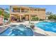 Backyard features a refreshing pool and spa, perfect for enjoying sunny days at 7301 Heggie Ave, Las Vegas, NV 89131