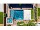 Stunning aerial view of a backyard oasis with a pool, spa, patio area, and lush landscaping at 7322 Columbia Rock Ct, Las Vegas, NV 89178