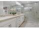 Primary bathroom featuring a glass shower, dual sinks, and modern fixtures at 7322 Columbia Rock Ct, Las Vegas, NV 89178