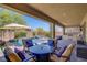 Relaxing outdoor living space with a pool, spa, and covered patio, creating a perfect oasis at 7322 Columbia Rock Ct, Las Vegas, NV 89178