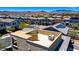 Enjoy panoramic views from this spacious rooftop patio, perfect for entertaining and outdoor living at 7322 Columbia Rock Ct, Las Vegas, NV 89178