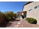 Secluded backyard with covered patio and drought tolerant landscaping at 7325 Rustic Crest St, Las Vegas, NV 89149
