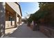 Backyard featuring a covered patio and desert landscaping at 7325 Rustic Crest St, Las Vegas, NV 89149