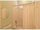 A bathroom with shower-tub combo behind a shower curtain at 7325 Rustic Crest St, Las Vegas, NV 89149