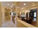 Elegant dining area with decorative lighting, hardwood floors, and access to additional rooms at 7325 Rustic Crest St, Las Vegas, NV 89149