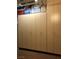 Spacious garage featuring storage cabinets, maximizing space and providing organized storage solutions at 7325 Rustic Crest St, Las Vegas, NV 89149