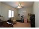 Office/Workout Room features carpet, plantation shutters, ceiling fan, and treadmill at 7325 Rustic Crest St, Las Vegas, NV 89149