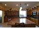 Spacious kitchen with custom cabinets, a large island, and modern appliances at 7325 Rustic Crest St, Las Vegas, NV 89149