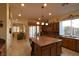 Spacious kitchen with custom cabinets, a large island, and modern appliances at 7325 Rustic Crest St, Las Vegas, NV 89149