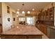 Spacious kitchen with custom cabinets, a large island, and modern appliances at 7325 Rustic Crest St, Las Vegas, NV 89149