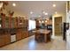 Spacious kitchen with custom cabinets, a large island, and modern appliances at 7325 Rustic Crest St, Las Vegas, NV 89149