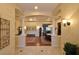 Open living area showcasing elegant columns, hardwood floors, and sophisticated decor at 7325 Rustic Crest St, Las Vegas, NV 89149