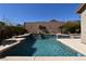 Backyard pool featuring a waterfall feature and mature landscaping at 7325 Rustic Crest St, Las Vegas, NV 89149