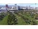 Expansive aerial view of the lush golf course with the city skyline in the background at 778 Vegas Valley Dr, Las Vegas, NV 89109