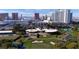 Aerial view of the golf course with the city skyline in the background and club house in the foreground at 778 Vegas Valley Dr, Las Vegas, NV 89109