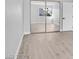 Bedroom with mirrored closet doors and wood look flooring at 778 Vegas Valley Dr, Las Vegas, NV 89109