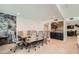 Formal dining area with fireplace and a sleek bar, perfect for entertaining guests at 778 Vegas Valley Dr, Las Vegas, NV 89109