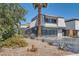 Modern house with desert landscaping, showcasing a unique architectural design with a patterned driveway at 778 Vegas Valley Dr, Las Vegas, NV 89109