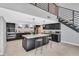 Modern kitchen featuring dark cabinetry and a large island with seating at 778 Vegas Valley Dr, Las Vegas, NV 89109