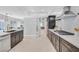 Modern kitchen features stainless steel appliances, dark cabinetry and sleek countertops at 778 Vegas Valley Dr, Las Vegas, NV 89109