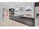 Stylish kitchen featuring dark wood cabinetry and modern stainless appliances at 778 Vegas Valley Dr, Las Vegas, NV 89109