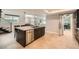 Beautiful island kitchen featuring stainless appliances, bar seating, and a wine fridge at 778 Vegas Valley Dr, Las Vegas, NV 89109