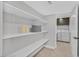 Laundry room features built in shelving and side by side washer and dryer at 778 Vegas Valley Dr, Las Vegas, NV 89109