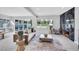 Bright living room with modern fireplace, stylish seating, and backyard views at 778 Vegas Valley Dr, Las Vegas, NV 89109