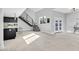 Open concept living space boasts modern staircase, sleek lighting and ample natural light at 778 Vegas Valley Dr, Las Vegas, NV 89109