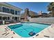 Backyard boasts a sparkling swimming pool with a spacious patio area, perfect for entertaining guests outdoors at 778 Vegas Valley Dr, Las Vegas, NV 89109
