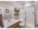 Bright bathroom with a glass-enclosed shower, neutral finishes, and modern fixtures at 8021 Adelaide Hills St, Las Vegas, NV 89113