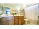 Bathroom featuring a double sink vanity and a shower/tub combo at 8021 Adelaide Hills St, Las Vegas, NV 89113