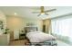 Digitally staged bedroom showcasing a cozy atmosphere with neutral tones and comfortable furnishings at 8021 Adelaide Hills St, Las Vegas, NV 89113