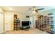This carpeted bedroom is used as a storage area at 8021 Adelaide Hills St, Las Vegas, NV 89113