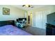 Carpeted bedroom with a workstation at 8021 Adelaide Hills St, Las Vegas, NV 89113