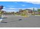 Gated community entrance with manicured landscaping and signage at the Evergreen neighborhood at 8405 Canyon Crevasse St, Las Vegas, NV 89166