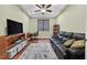 Comfortable office space with a sofa, desk, and ample storage solutions at 8405 Canyon Crevasse St, Las Vegas, NV 89166