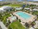 Community pool and lounge area with lounge chairs, landscaped areas, and clear water for relaxation at 8405 Canyon Crevasse St, Las Vegas, NV 89166