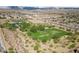 Aerial view of community park featuring green space, walking trails, and mature trees surrounded by residential area at 8547 Benidorm Ave, Las Vegas, NV 89178