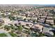 Extensive aerial view of a suburban neighborhood with mountain backdrop at 8547 Benidorm Ave, Las Vegas, NV 89178