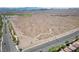 View of community park featuring walking trails meandering through natural desert landscaping and greenery at 8547 Benidorm Ave, Las Vegas, NV 89178