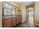 Spacious bathroom featuring custom tile work, ample cabinet space, and neutral wall color at 8547 Benidorm Ave, Las Vegas, NV 89178