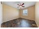 Bedroom featuring tile floors, a ceiling fan, and a window with natural light at 8547 Benidorm Ave, Las Vegas, NV 89178
