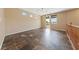 Inviting common space with tile flooring, bright lighting, and door to outdoor balcony at 8547 Benidorm Ave, Las Vegas, NV 89178