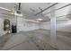Spacious garage with ample storage cabinets and shelving at 8547 Benidorm Ave, Las Vegas, NV 89178