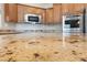 Close-up of tan-colored granite countertop in kitchen at 8547 Benidorm Ave, Las Vegas, NV 89178