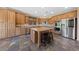 Updated kitchen with stainless steel appliances, granite countertops, and a center island at 8547 Benidorm Ave, Las Vegas, NV 89178